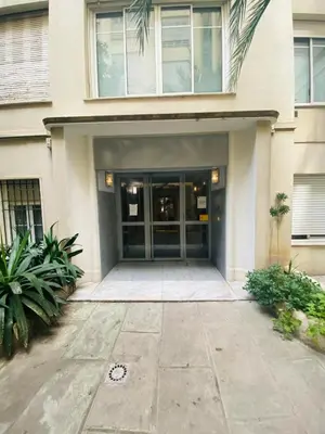 a building with a large glass entry door at Promenade des Anglais /Carré d'or - 2 mins plages in Nice
