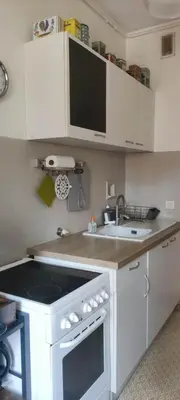 a bathroom with a sink and a mirror at Central Studio in Nice