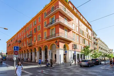 an orange building on the corner of a street at #48 Suite Jean top floor terrace 5min walk sea AC in Nice