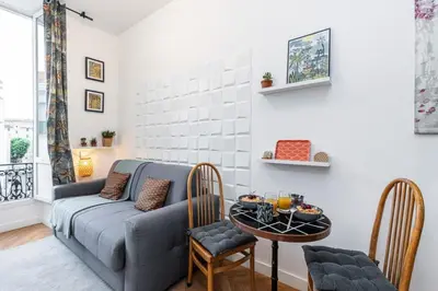 a living room with a couch and a table at MY CASA - FOCH - Superb Suite w AC Downtown in Nice