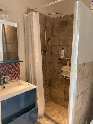 a bathroom with a shower and a sink at Logement privé Nice - Crémat in Nice