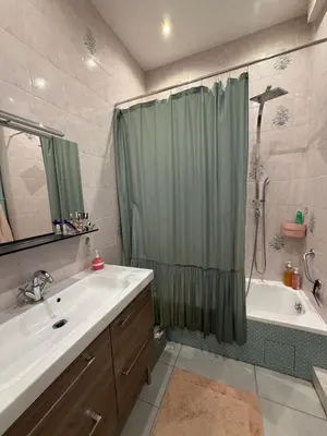 a bathroom with a shower and a sink and a tub at Dolce bilocale con terrazzo in Nice