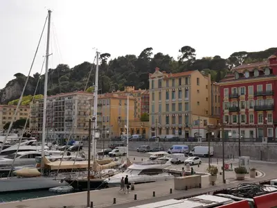 a marina with boats in a harbor with buildings at LOVELY STUDIO - Port de Nice in Nice