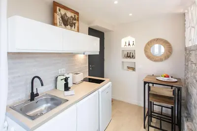 a kitchen with a sink and a counter top at #49 Perfect location Saleya old town 2mins to Sea AC in Nice