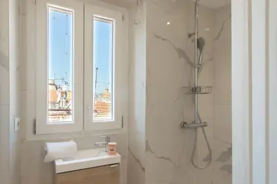 a bathroom with a shower and a sink at #49 Perfect location Saleya old town 2mins to Sea AC in Nice