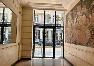 an entrance to a building with a glass door at Studio calme Nice hyper centre in Nice