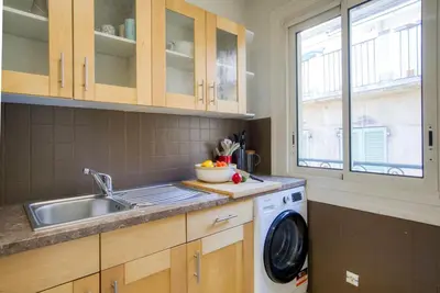 a wreath made out of tree branches on a wall at Cosy, modern, fully equipped, air conditioning, Nice historical, old town, 1minute walk from beach - 