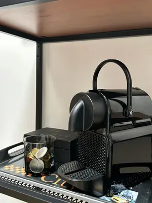 a black toaster sitting on top of a table at Studio HYPER CENTRE in Nice