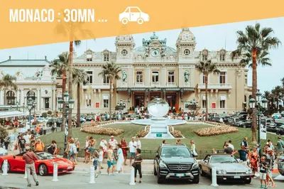 a group of people standing around a fountain in front of a building at Studio cozy et moderne dans résidence à Nice in Nice