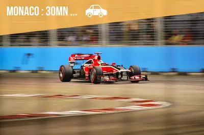 a red racing car is on a track at Studio cozy et moderne dans résidence à Nice in Nice