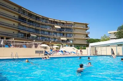 a group of people swimming in a swimming pool at Résidence Héliotel Marine - maeva Home - Studio 4 personnes - Confort MAE-5084 in Cros-de-Cagnes