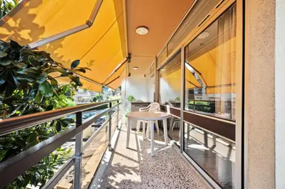 a balcony with a table and some plants at Résidence Héliotel Marine - maeva Home - Studio 4 personnes - Confort MAE-5084 in Cros-de-Cagnes