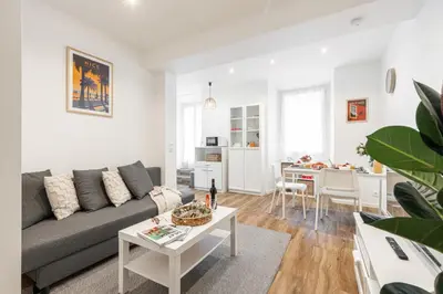 a living room with a couch and a table at MY CASA - MARI 71 - Unique Apt Near Sea in Nice