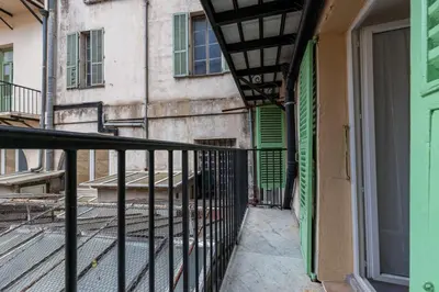 a balcony of a building with a green door at MY CASA - MARI 71 - Unique Apt Near Sea in Nice