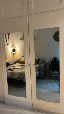 a room with a bedroom with a bed and a mirror at Studio NICE CENTRE sur Avenue Jean Medecin MER à 8 minutes de marche in Nice