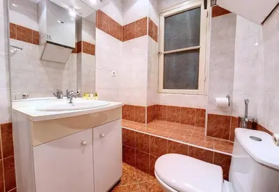 a bathroom with a toilet and a sink at Nestor&Jeeves - FRENCHY - Hyper center, Closer sea and Place Massena in Nice