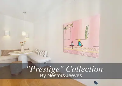 a bathroom with a toilet and a painting on the wall at Nestor&Jeeves - RIVIERA - Central - Near Beach in Nice