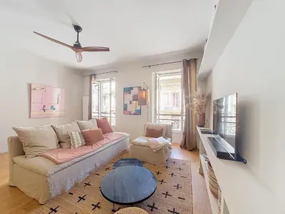 a living room with a couch and a table at Nestor&Jeeves - RIVIERA - Central - Near Beach in Nice
