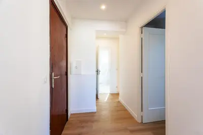 an empty hallway with an open door and a hallway at LE MONT ALBAN AP4360 By Riviera Holiday Homes in Villefranche-sur-Mer