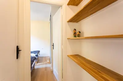 a hallway with wooden shelves in a house at LE MONT ALBAN AP4360 By Riviera Holiday Homes in Villefranche-sur-Mer