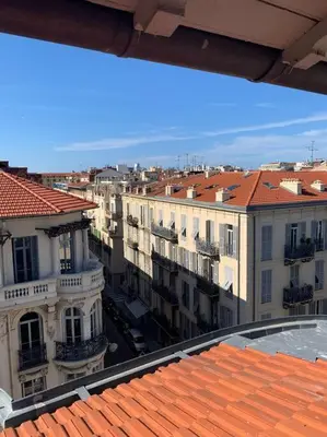 a view of a city with buildings and roofs at Heart of Nice-Rooftop Seaside Studio in Nice