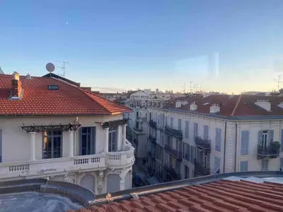 a view of a city with buildings and roofs at Heart of Nice-Rooftop Seaside Studio in Nice