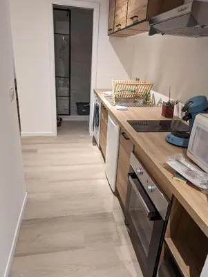 a kitchen with a counter and a dishwasher at Holiday Nice Studio in Nice