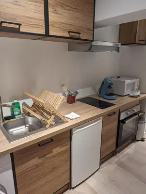 a kitchen with a sink and a counter top at Holiday Nice Studio in Nice