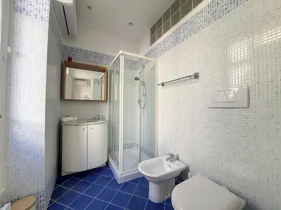 a bathroom with a toilet and a shower and a sink at Nestor&Jeeves - JACARANDA - Carre d Or, Proche mer in Nice