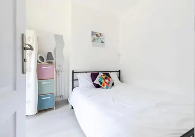 a kitchen with a sink and a stove top oven at Beautiful & spacious 2 bed Apt near Nice Center in Nice