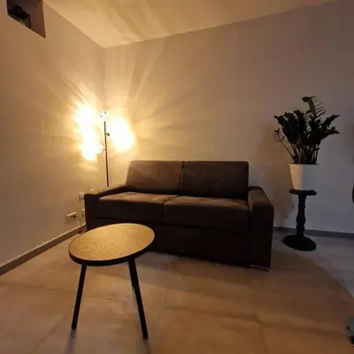a living room with a couch and a table at Vieille-Ville de Nice 2 pièces proche Mer in Nice