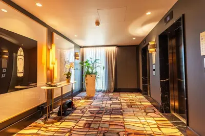 a hallway with a tile floor in a building at PLAZA TERRACE AP4065 by RIVIERA HOLIDAY HOMES in Nice