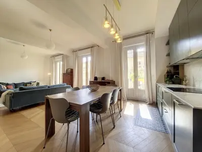 a kitchen and living room with a table and chairs at Nestor&Jeeves - BELLE EPOQUE - Central, Close sea in Nice