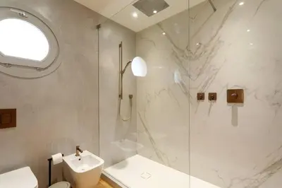 a bathroom with a shower and a toilet and a sink at Luxury Villa Nice in Nice