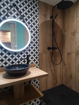 a bathroom with a sink and a mirror at Cosy Haven 5 min from Nice Carnival Hyper-Center! in Nice