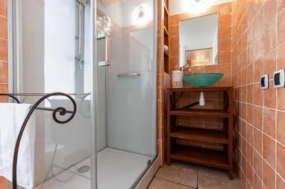 a bathroom with a shower and a sink at Cozy 1 Bdr at Nice Port in Nice