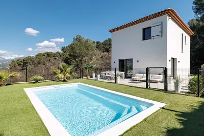 a villa with a swimming pool and a house at Villa Riviera - Nouveaute entre mer et montagnes in Colomars