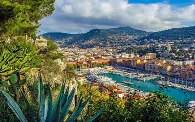 a view of a harbor with boats in the water at Downtown in Nice
