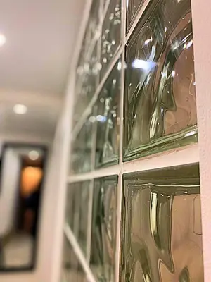 a bunch of glass windows on a wall at Côte d'Azur Oasis Suites in Nice