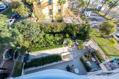 an overhead view of a park with trees and bushes at FAMILY APARTMENT SEA VIEW in Nice