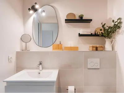 a bathroom with a sink and a mirror at Modern apartment with AC near Old Nice & Beach in Nice