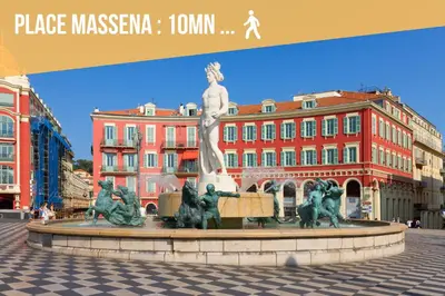a statue in a plaza in front of a building at Appartements Nice Centre Proche Mer Carré d'Or in Nice