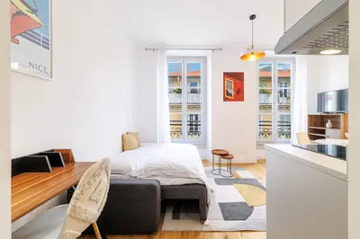 a small apartment with a bed and a kitchen at Charming City Center Studio 406 in Nice