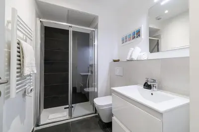 a bathroom with a toilet and a sink and a shower at Charming City Center Studio 406 in Nice