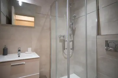 a bathroom with a shower and a sink at GuestReady - A peaceful stay near the marina in Nice