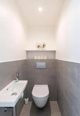 a bathroom with a white toilet and a sink at MY CASA - JOFFRE 2-4 - Bright Central 1 bedroom Near Massena in Nice