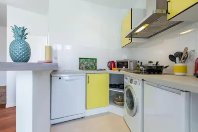 a kitchen with a washer and dryer in it at MY CASA - GIOFFREDO 55 - 2 beds w AC on Massena Square in Nice