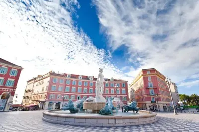 a statue in the middle of a square with buildings at MY CASA - DELOYE - Spacious Quiet studio w AC near Old Town in Nice