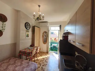 a small bedroom with a bed and a tv at Hypercentre Nice Jean Medecin in Nice