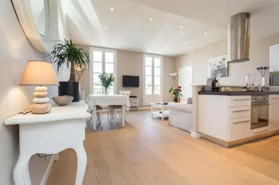 a living room with a kitchen and a dining room at MY CASA - JEAN JAURES - 90m2 w AC 2min to Beach in Nice